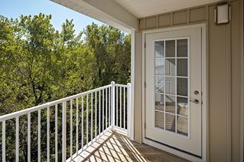 a balcony with a view at Reveal Hackensack apartments